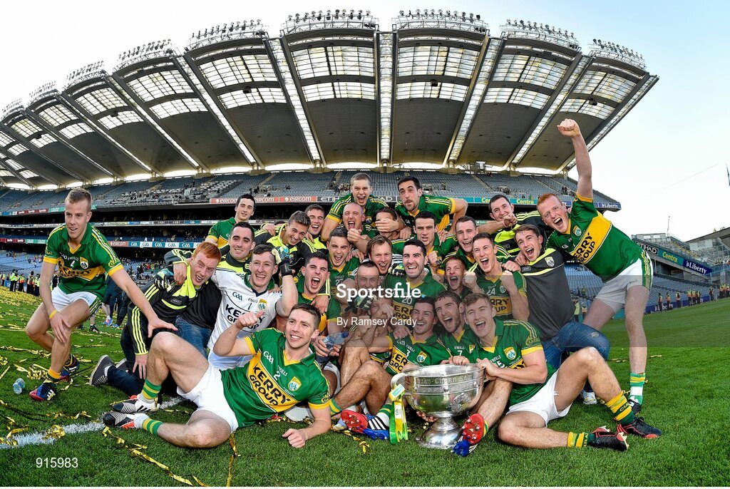 21 September 2014; The Kerry squad celebrates with the Sam Maguire cup after the game. GAA Football All Ireland Senior Championship Final, Kerry v Donegal. Croke Park, Dublin. Picture credit: Ramsey Cardy / SPORTSFILE