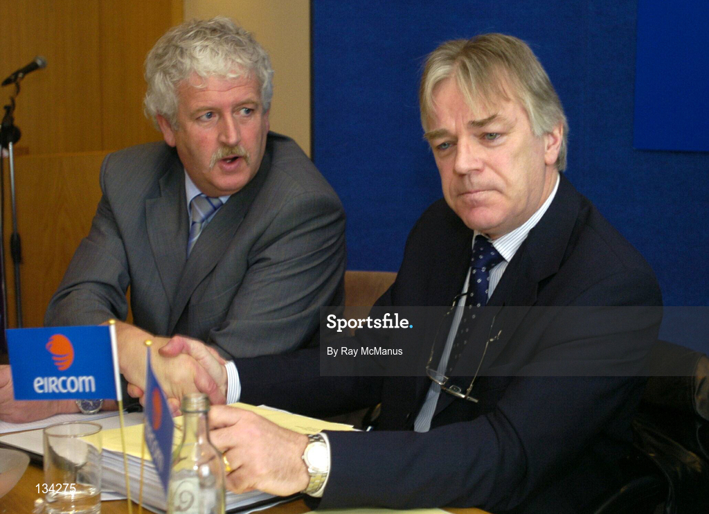 13 March 2004; FAI President Milo Corcoran, left, congratulates Declan O'Looney on his election as Chairman of the Eircom League of Ireland during the Eircom League AGM at the Clarion Hotel in the International Financial Services Centre, Dublin. Photo by Ray McManus/Sportsfile