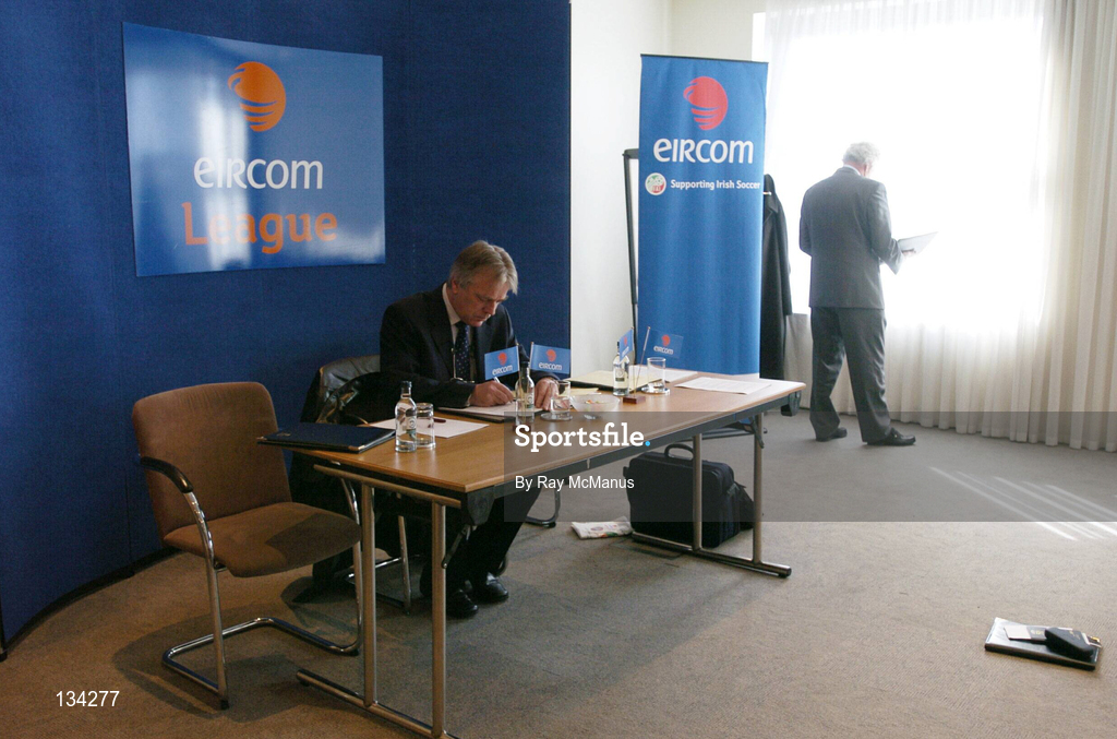 13 March 2004; Declan O'Looney, acting Chairman of the eircom League of Ireland, and FAI President Milo Corcoran, right, check their notes ahead of the Eircom League AGM at the Clarion Hotel in the International Financial Services Centre, Dublin. Photo by Ray McManus/Sportsfile