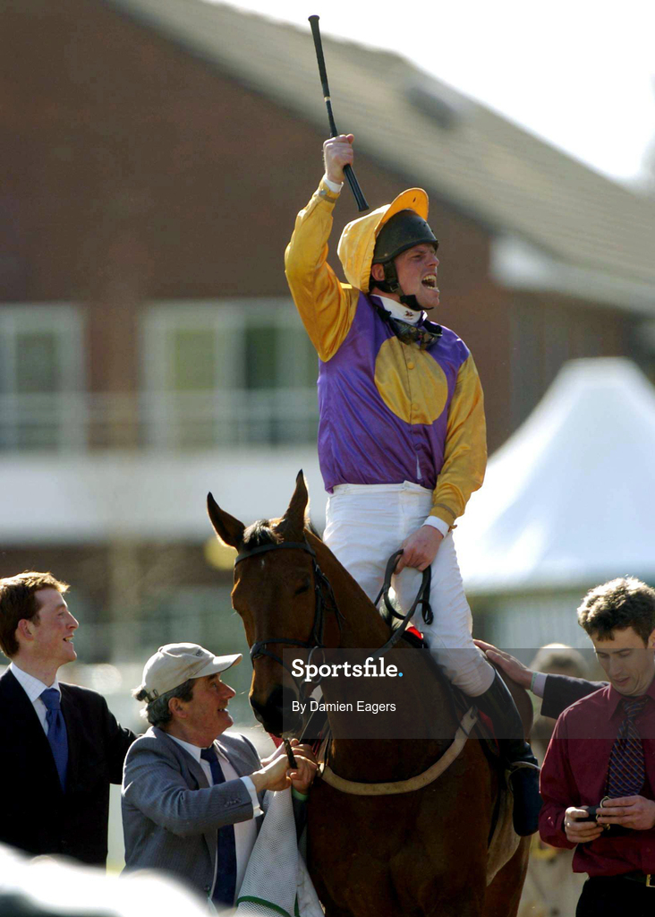 16 March 2004; Jockey Barry Cash celebrates after winning the Letheby & Christopher Supreme Novices Hurdle on Brave Inca during Day One of the Cheltenham Racing Festival at Prestbury Park in Cheltenham, England. Photo by Damien Eagers/Sportsfile