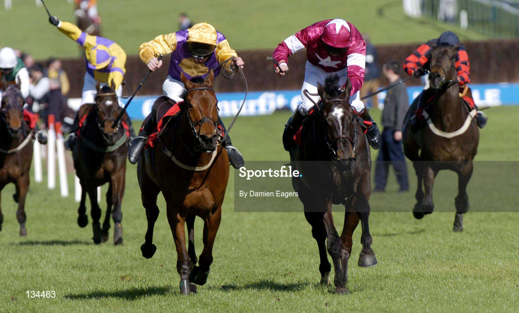 16 March 2004; Brave Inca, left, with Barry Cash up, races alongside eventual second place finisher War of Attrition, with Conor O'Dwyer up, on their way to winning the Letheby & Christopher Supreme Novices Hurdle during Day One of the Cheltenham Racing Festival at Prestbury Park in Cheltenham, England. Photo by Damien Eagers/Sportsfile