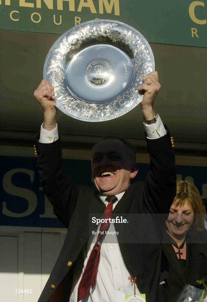 16 March 2004; Laurence Byrne, owner of Hardy Eustace, celebrates after winning the Smurfit Champion Hurdle Challenge Trophy during Day One of the Cheltenham Racing Festival at Prestbury Park in Cheltenham, England. Photo by Pat Murphy/Sportsfile