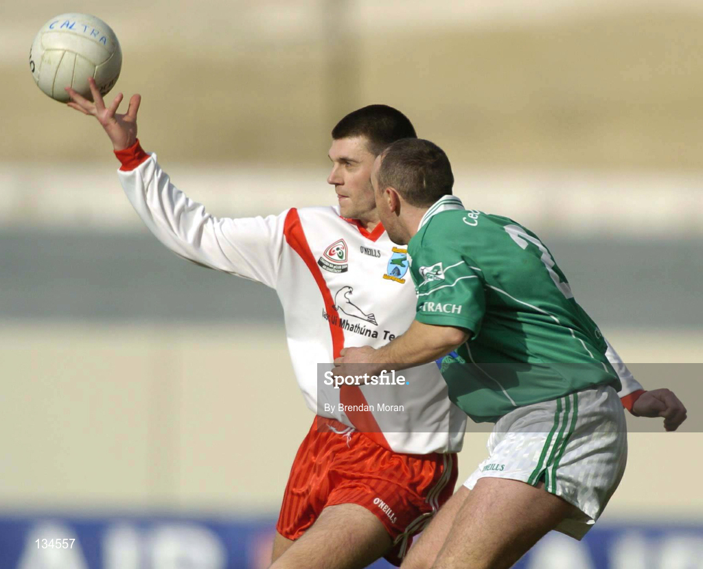 17 March 2004; Aodan MacGearailt of An Gaeltacht is tackled by Jarlath Murray of Caltra during the AIB All-Ireland Senior Club Football Championship Final between An Gaeltacht and Caltra at Croke Park in Dublin. Photo by Brendan Moran/Sportsfile