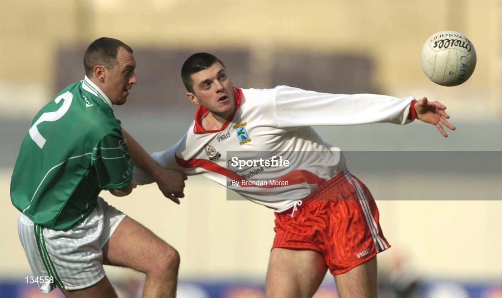 17 March 2004; Aodan MacGearailt of An Gaeltacht is tackled by Jarlath Murray of Caltra during the AIB All-Ireland Senior Club Football Championship Final between An Gaeltacht and Caltra at Croke Park in Dublin. Photo by Brendan Moran/Sportsfile