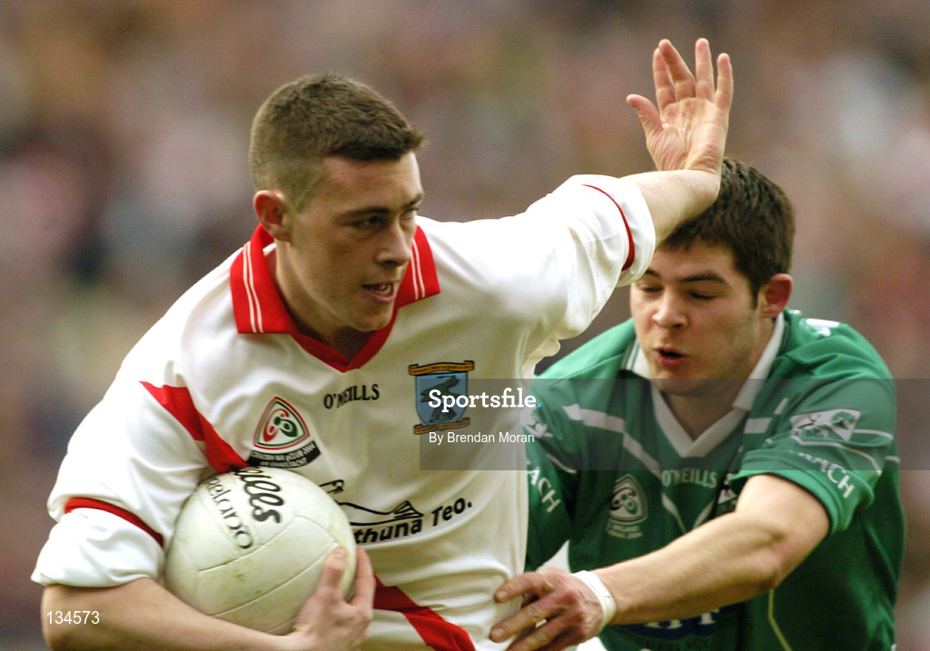17 March 2004; Ronan O'Flatharta of An Gaeltacht in action against Matthew Killilea of Caltra during the AIB All-Ireland Senior Club Football Championship Final between An Gaeltacht and Caltra at Croke Park in Dublin. Photo by Brendan Moran/Sportsfile