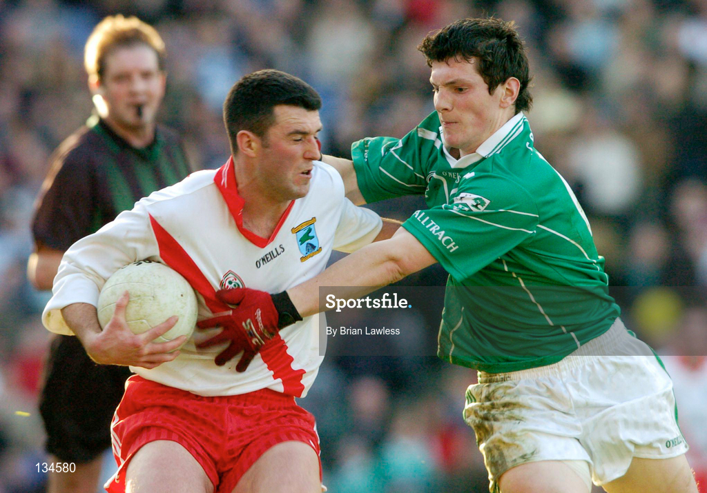 17 March 2004; Roibeard Mac Gearailt of An Ghaeltacht in action against Michael Meehan of Caltra during the AIB All-Ireland Senior Club Football Championship Final between An Gaeltacht and Caltra at Croke Park in Dublin. Photo by Brian Lawless/Sportsfile