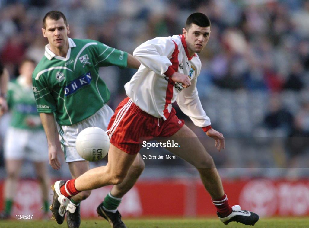 17 March 2004; Aodan MacGearailt of An Gaeltacht in action against Enda Meehan of Caltra during the AIB All-Ireland Senior Club Football Championship Final between An Gaeltacht and Caltra at Croke Park in Dublin. Photo by Brendan Moran/Sportsfile