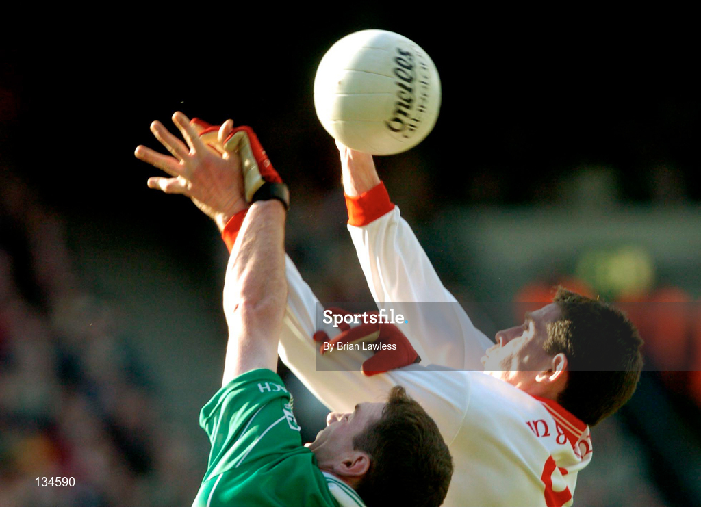 17 March 2004; Pol O Cuinn of An Gaeltacht in action against Damien Cunniffe of Caltra during the AIB All-Ireland Senior Club Football Championship Final between An Gaeltacht and Caltra at Croke Park in Dublin. Photo by Brian Lawless/Sportsfile