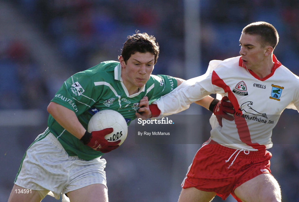 17 March 2004; Michael Meehan of Caltra is tackled by Marc O Se of An Gaeltacht during the AIB All-Ireland Senior Club Football Championship Final between An Gaeltacht and Caltra at Croke Park in Dublin. Photo by Ray McManus/Sportsfile