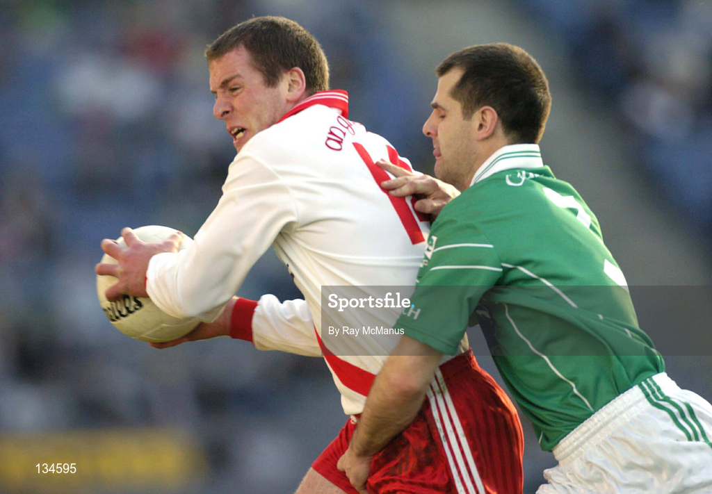 17 March 2004; Dara O Cinneide of An Gaeltacht in action against Enda Meehan of Caltra during the AIB All-Ireland Senior Club Football Championship Final between An Gaeltacht and Caltra at Croke Park in Dublin. Photo by Ray McManus/Sportsfile