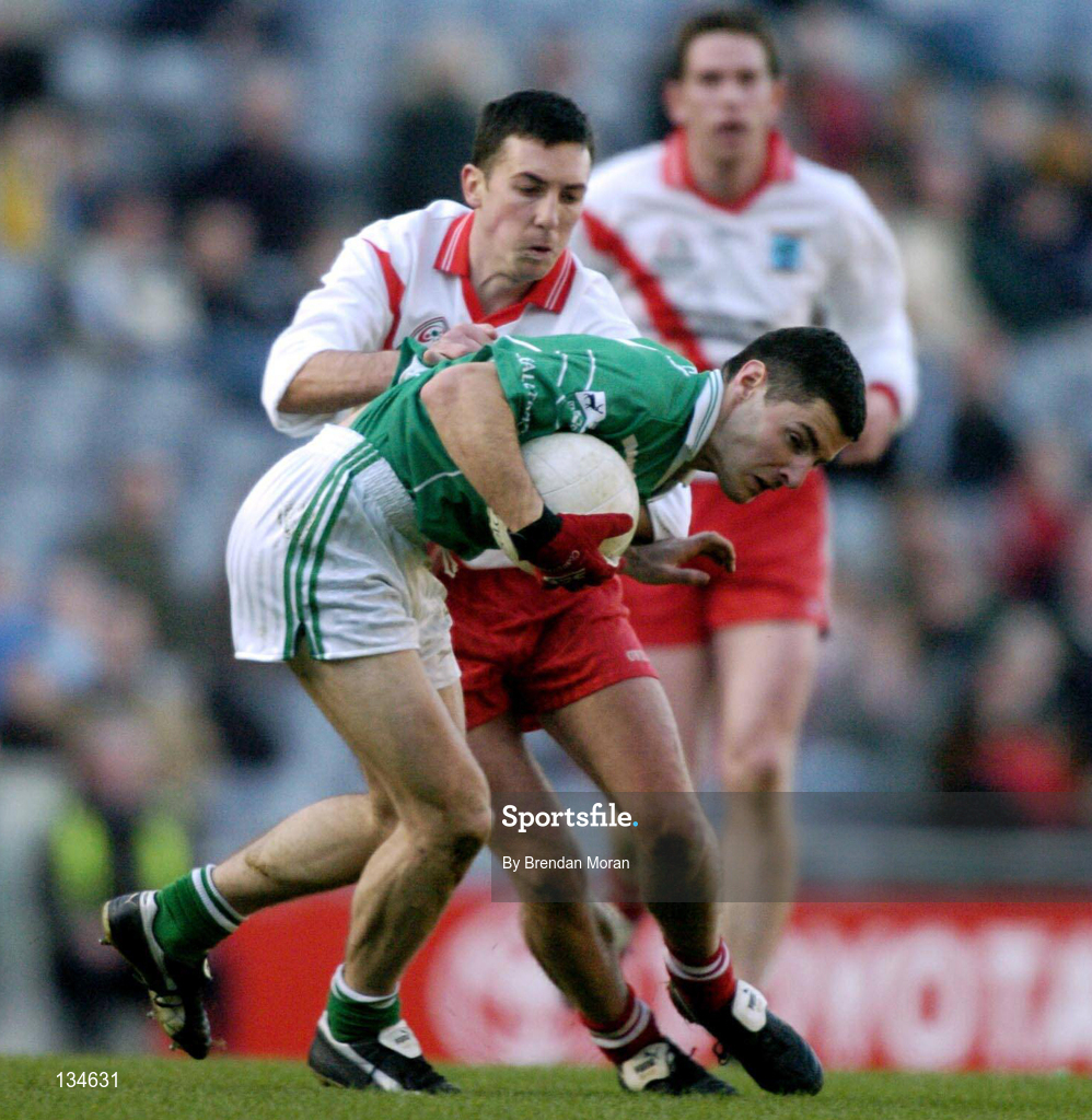17 March 2004; Noel Meehan of Caltra in action against Sean Mac Sithigh of An Gaeltacht during the AIB All-Ireland Senior Club Football Championship Final between An Gaeltacht and Caltra at Croke Park in Dublin. Photo by Brendan Moran/Sportsfile