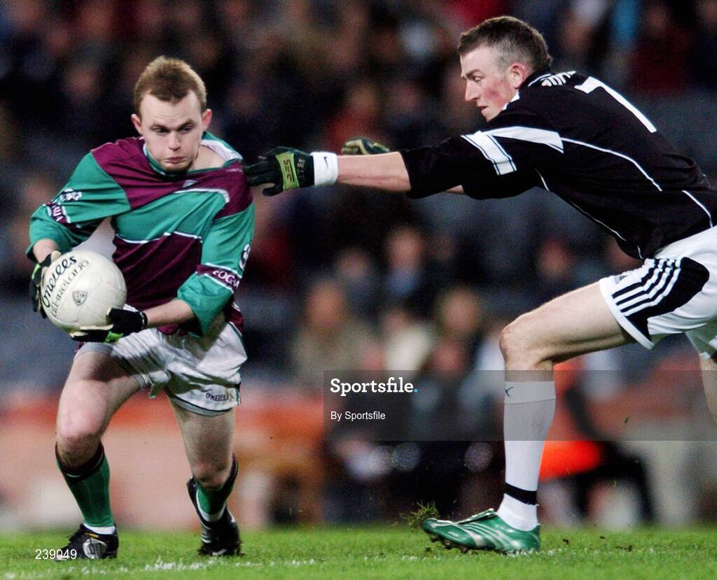 10 March 2007; Ciaran McGoldrick, Eoghan Ruadh, in action against Francis Wallace, Ardfert. Ardfert (Kerry) v Eoghan Ruadh (Derry), All-Ireland Intermediate Club Football Championship Final, Croke Park, Dublin. Photo by Sportsfile *** Local Caption ***