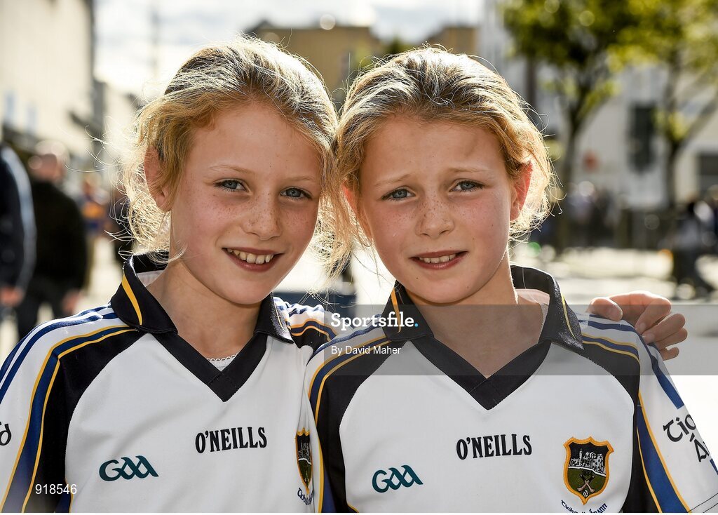 27 September 2014; Tipperary supporters, and twin sisters, Ellen, left, and Niamh Cunneen, age 11, from Silvermines, Co. Tipperary, ahead of the game. GAA Hurling All Ireland Senior Championship Final Replay, Kilkenny v Tipperary. Croke Park, Dublin. Picture credit: David Maher / SPORTSFILE
