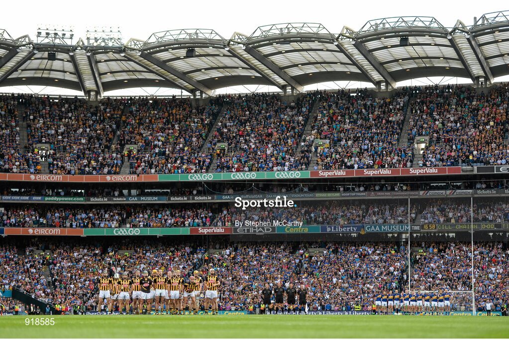 27 September 2014; Kilkenny and Tipperary teams and officials during the National Anthem. GAA Hurling All Ireland Senior Championship Final Replay, Kilkenny v Tipperary. Croke Park, Dublin. Picture credit: Stephen McCarthy / SPORTSFILE