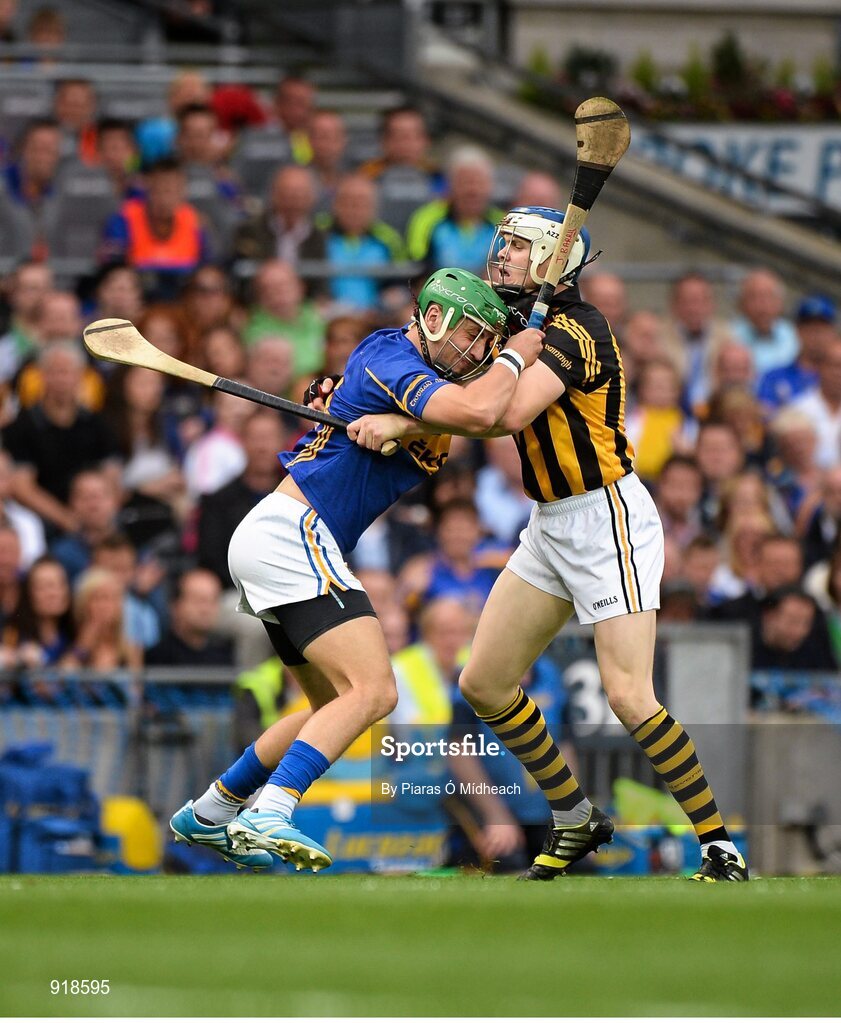 27 September 2014; TJ Reid, Kilkenny, in action against James Barry, Tipperary. GAA Hurling All Ireland Senior Championship Final Replay, Kilkenny v Tipperary. Croke Park, Dublin. Picture credit: Piaras Ó Mídheach / SPORTSFILE