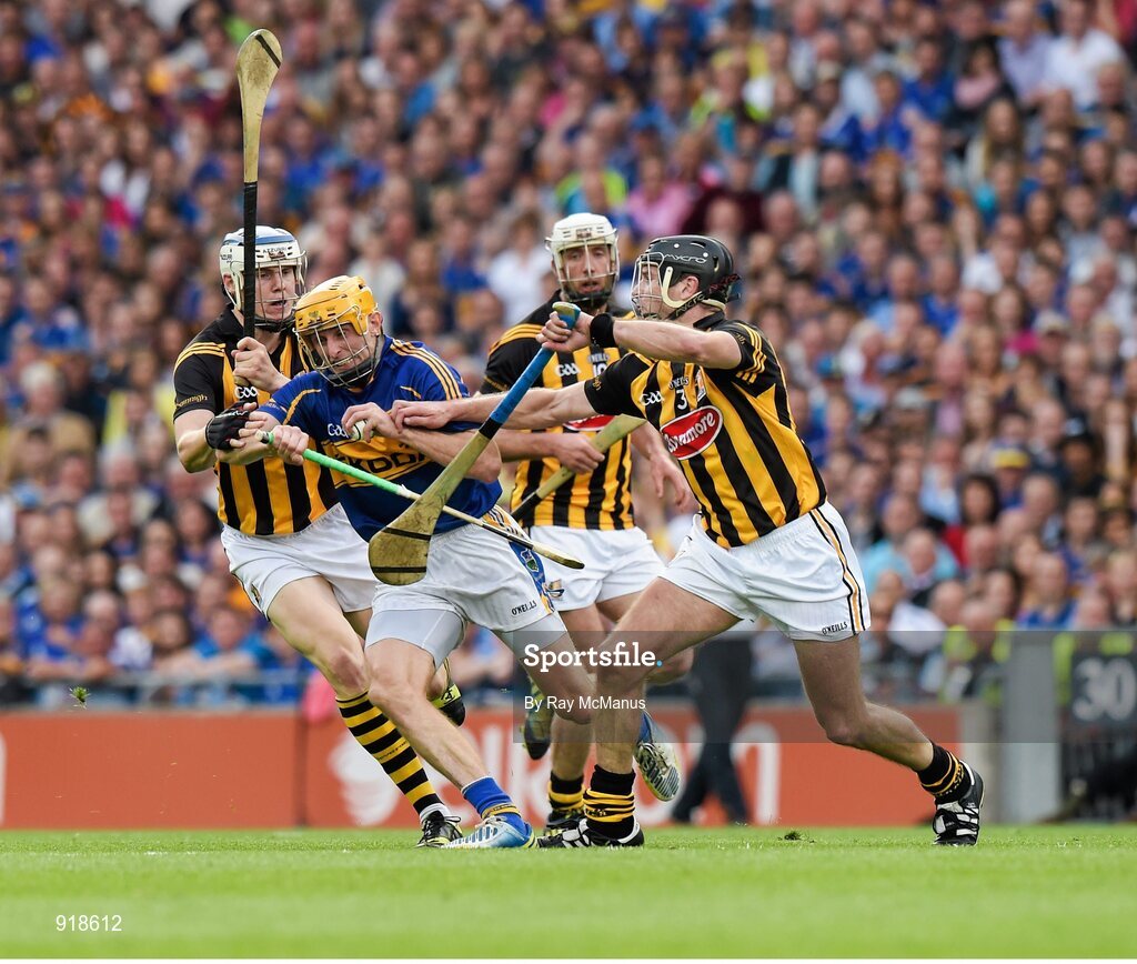 27 September 2014; Shane McGrath, Tipperary, in action against TJ Reid, left, and JJ Delaney, Kilkenny. GAA Hurling All Ireland Senior Championship Final Replay, Kilkenny v Tipperary. Croke Park, Dublin. Picture credit: Ray McManus / SPORTSFILE