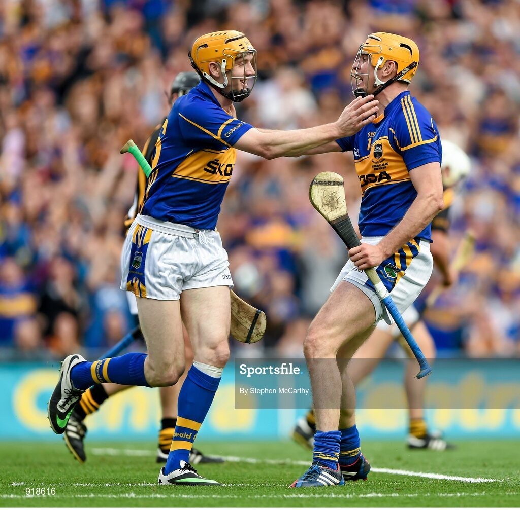 27 September 2014; Tipperary's Seamus Callanan, right, celebrates with team-mate Lar Corbett after scoring his side's first goal. GAA Hurling All Ireland Senior Championship Final Replay, Kilkenny v Tipperary. Croke Park, Dublin. Picture credit: Stephen McCarthy / SPORTSFILE