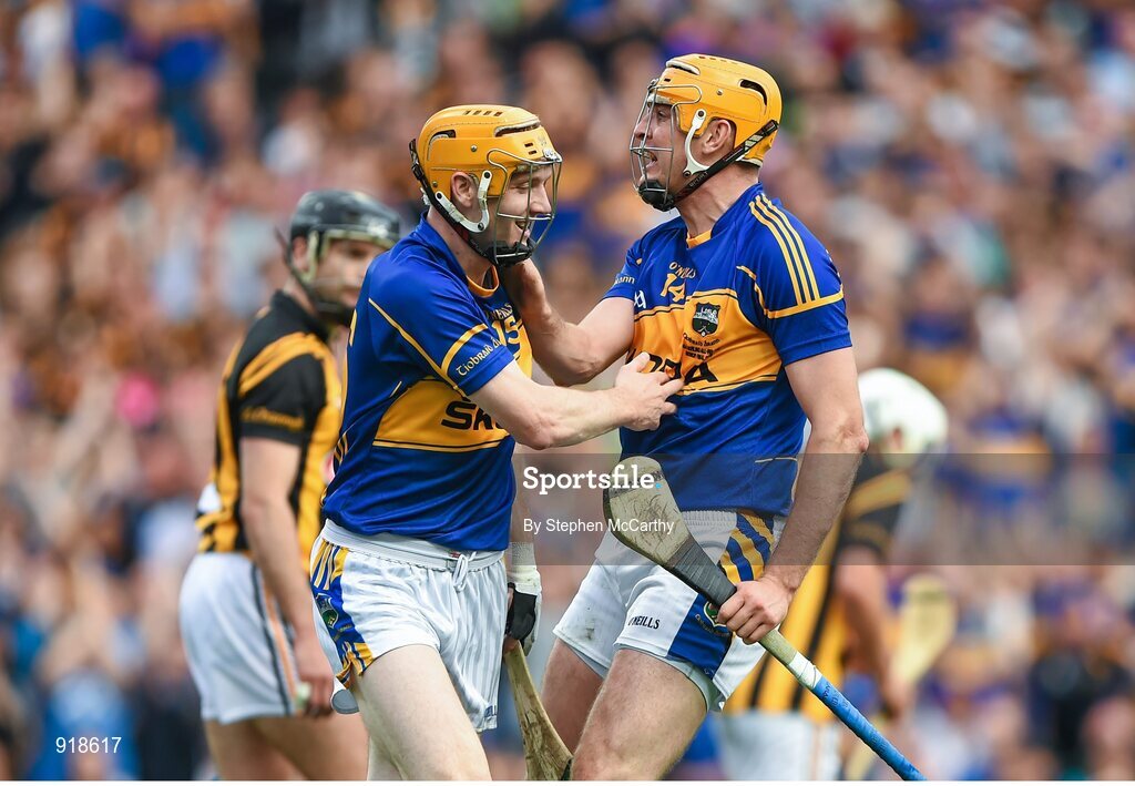 27 September 2014; Tipperary's Seamus Callanan, right, celebrates with team-mate Lar Corbett after scoring his side's first goal. GAA Hurling All Ireland Senior Championship Final Replay, Kilkenny v Tipperary. Croke Park, Dublin. Picture credit: Stephen McCarthy / SPORTSFILE