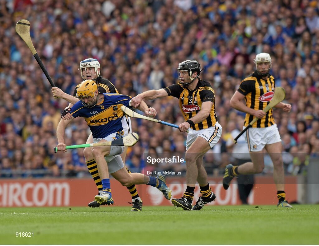 27 September 2014; Shane McGrath, Tipperary, under pressure from TJ Reid, left, and JJ Delaney, Kilkenny. GAA Hurling All Ireland Senior Championship Final Replay, Kilkenny v Tipperary. Croke Park, Dublin. Picture credit: Ray McManus / SPORTSFILE