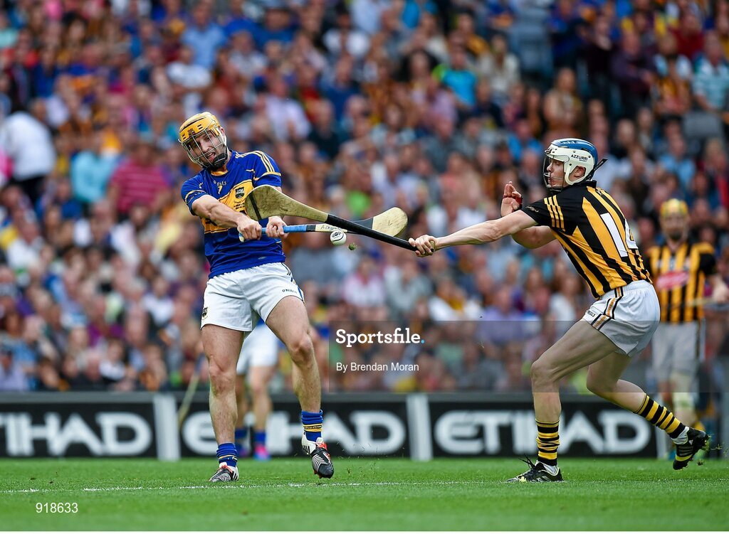 27 September 2014; TJ Reid, Kilkenny, blocks a shot from Kieran Bergin, Tipperary. GAA Hurling All Ireland Senior Championship Final Replay, Kilkenny v Tipperary. Croke Park, Dublin. Picture credit: Brendan Moran / SPORTSFILE