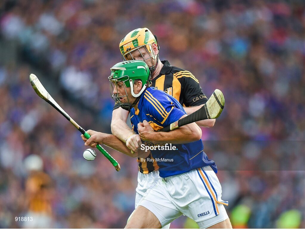 27 September 2014; James Woodlock, Tipperary, in action against Richie Power, Kilkenny. GAA Hurling All Ireland Senior Championship Final Replay, Kilkenny v Tipperary. Croke Park, Dublin. Picture credit: Ray McManus / SPORTSFILE