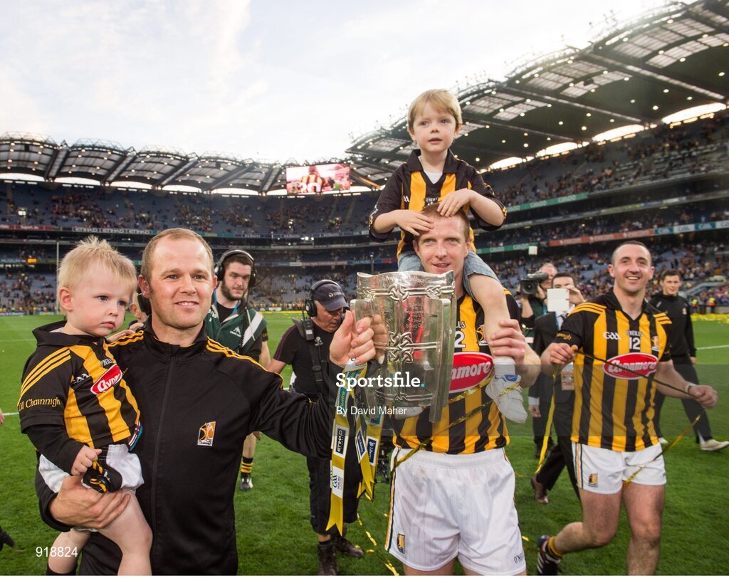 27 September 2014; Kilkenny's Henry Shefflin and his son Henry and Tommy Walsh, with his son Finn, celebrate at the end of the game. GAA Hurling All Ireland Senior Championship Final Replay, Kilkenny v Tipperary. Croke Park, Dublin. Picture credit: David Maher / SPORTSFILE