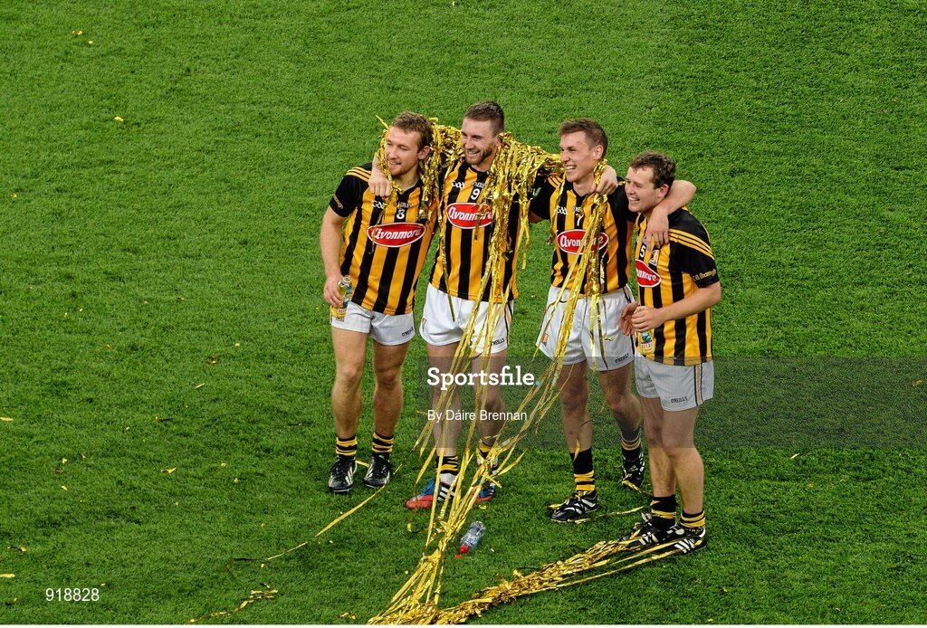 27 September 2014; Kilkenny players, left to right, Richie Hogan, Conor Fogarty, Cillian Buckley, and Pádraig Walsh, celebrate after the game. GAA Hurling All Ireland Senior Championship Final Replay, Kilkenny v Tipperary. Croke Park, Dublin. Picture credit: Dáire Brennan / SPORTSFILE