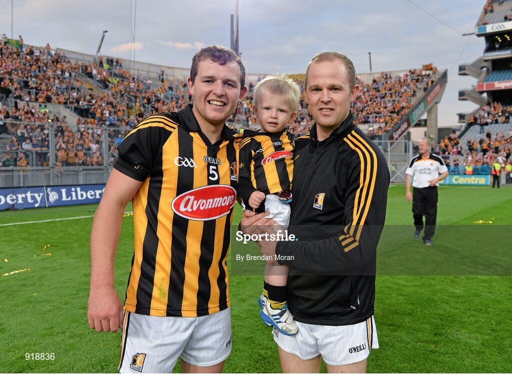27 September 2014; Kilkenny players, and brothers, Padraig Walsh, left, and Tommy Walsh with his son Finn after the game. GAA Hurling All Ireland Senior Championship Final Replay, Kilkenny v Tipperary. Croke Park, Dublin. Picture credit: Brendan Moran / SPORTSFILE