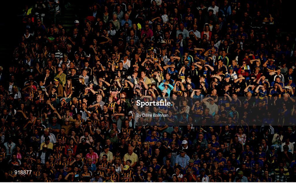 27 September 2014; Supporters shield their eyes from the sun in the Cusack Stand during the second half. GAA Hurling All Ireland Senior Championship Final Replay, Kilkenny v Tipperary. Croke Park, Dublin. Picture credit: Dáire Brennan / SPORTSFILE