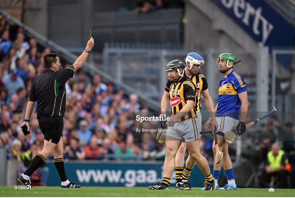27 September 2014; Referee Brian Gavin shows Tipperary's James Barry a yellow card. GAA Hurling All Ireland Senior Championship Final Replay, Kilkenny v Tipperary. Croke Park, Dublin.  Picture credit: Brendan Moran / SPORTSFILE