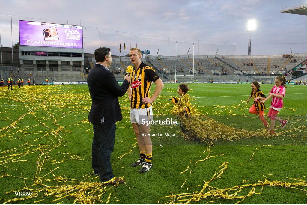 27 September 2014; Kilkenny's Henry Shefflin is interviewed by Tipperary man Paul Collins of Today FM as children of the Kilkenny squad and backroom team play on the pitch after the game. GAA Hurling All Ireland Senior Championship Final Replay, Kilkenny v Tipperary. Croke Park, Dublin. Picture credit: Brendan Moran / SPORTSFILE