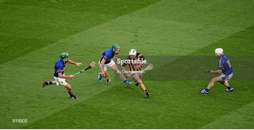 27 September 2014; Pádraig Walsh, Kilkenny, in action against Tipperary players, left to right, James Woodlock, Cathal Barrett, and Gear—id Ryan. GAA Hurling All Ireland Senior Championship Final Replay, Kilkenny v Tipperary. Croke Park, Dublin. Picture credit: Dáire Brennan / SPORTSFILE