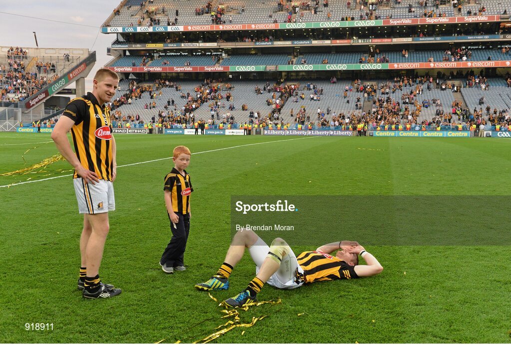27 September 2014; Kilkenny's John Power, left, and Richie Power with Richie's son Rory on the pitch after the game. GAA Hurling All Ireland Senior Championship Final Replay, Kilkenny v Tipperary. Croke Park, Dublin. Picture credit: Brendan Moran / SPORTSFILE