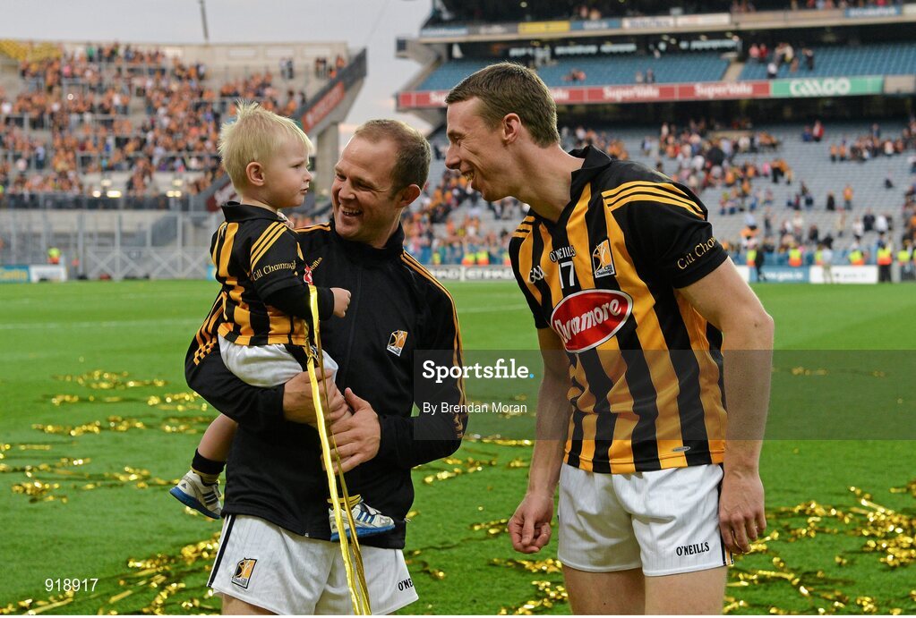 27 September 2014; Kilkenny's Tommy Walsh with his son Finn and team-mate Brian Hogan after the game. GAA Hurling All Ireland Senior Championship Final Replay, Kilkenny v Tipperary. Croke Park, Dublin. Picture credit: Brendan Moran / SPORTSFILE