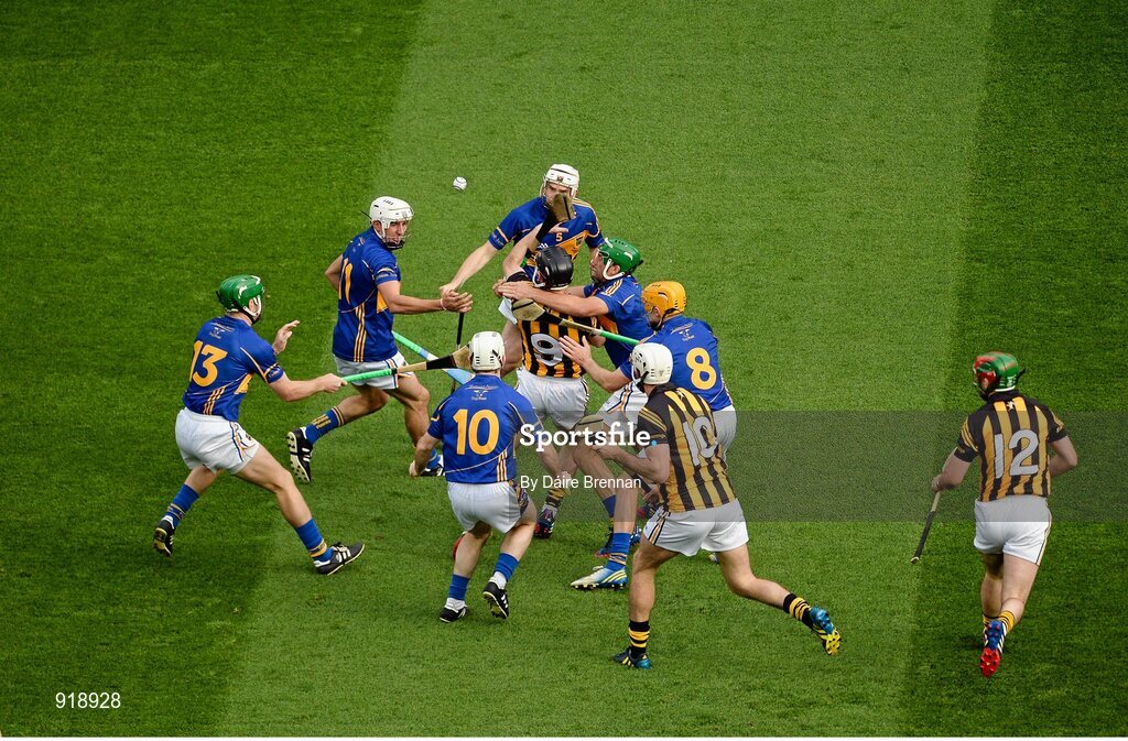 27 September 2014; Kilkenny players, left to right, Conor Fogarty, Michael Fennelly, and Eoin Larkin, in action against Tipperary players, left to right, Noel McGrath, Patrick Maher, Gearóid Ryan, Brendan Maher, James Woodlock, and Shane McGrath. GAA Hurling All Ireland Senior Championship Final Replay, Kilkenny v Tipperary. Croke Park, Dublin. Picture credit: Dáire Brennan / SPORTSFILE