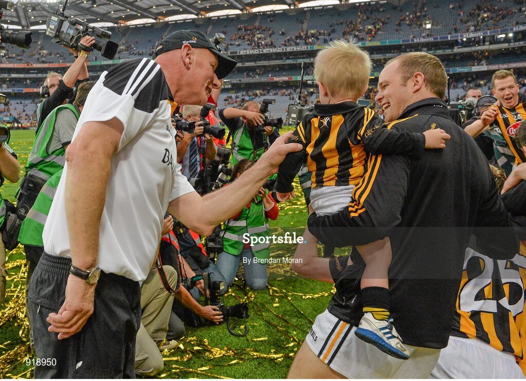 27 September 2014; Kilkenny's Tommy Walsh and his son Finn with Kilkenny manager Brian Cody after the game. GAA Hurling All Ireland Senior Championship Final Replay, Kilkenny v Tipperary. Croke Park, Dublin. Picture credit: Brendan Moran / SPORTSFILE