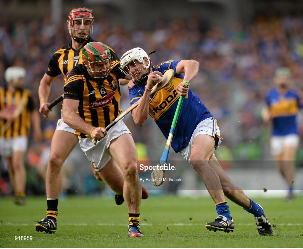 27 September 2014; Patrick Maher, Tipperary, in action against Kieran Joyce, 6, and Cillian Buckley, Kilkenny. GAA Hurling All Ireland Senior Championship Final Replay, Kilkenny v Tipperary. Croke Park, Dublin. Picture credit: Piaras Ó Mídheach / SPORTSFILE