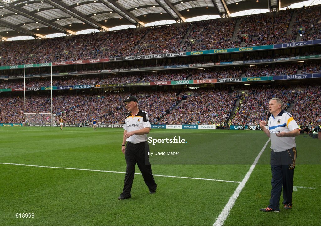 27 September 2014; Kilkenny manager Brian Cody, left, and Tipperary manager Eamon O'Shea watch on during the closing moments of the game. GAA Hurling All Ireland Senior Championship Final Replay, Kilkenny v Tipperary. Croke Park, Dublin. Picture credit: David Maher / SPORTSFILE