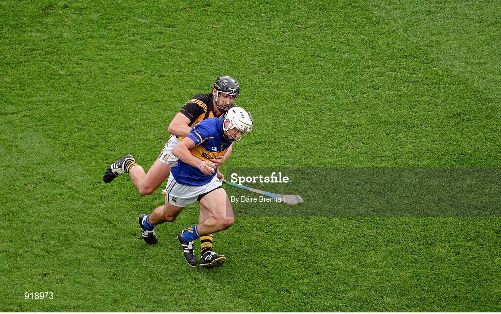 27 September 2014; Patrick Maher, Tipperary, in action against Jackie Tyrrell, Kilkenny. GAA Hurling All Ireland Senior Championship Final Replay, Kilkenny v Tipperary. Croke Park, Dublin. Picture credit: Dáire Brennan / SPORTSFILE