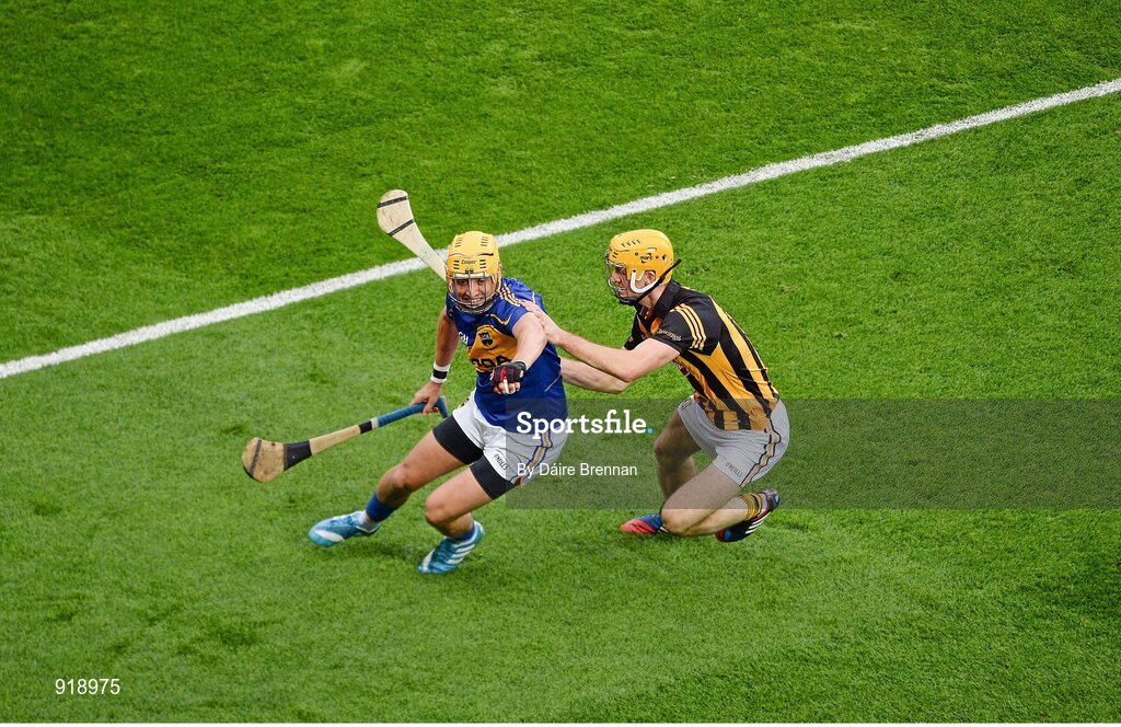 27 September 2014; James Barry, Tipperary, in action against Colin Fennelly, Kilkenny. GAA Hurling All Ireland Senior Championship Final Replay, Kilkenny v Tipperary. Croke Park, Dublin. Picture credit: Dáire Brennan / SPORTSFILE