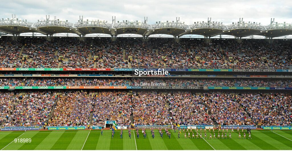27 September 2014; The Kilkenny and Tipperary teams parade behind the Artane School of Music Band before the game. GAA Hurling All Ireland Senior Championship Final Replay, Kilkenny v Tipperary. Croke Park, Dublin. Picture credit: Dáire Brennan / SPORTSFILE