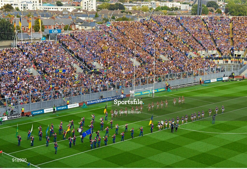 27 September 2014; The Kilkenny and Tipperary teams parade behind the Artane School of Music Band before the game. GAA Hurling All Ireland Senior Championship Final Replay, Kilkenny v Tipperary. Croke Park, Dublin. Picture credit: Dáire Brennan / SPORTSFILE