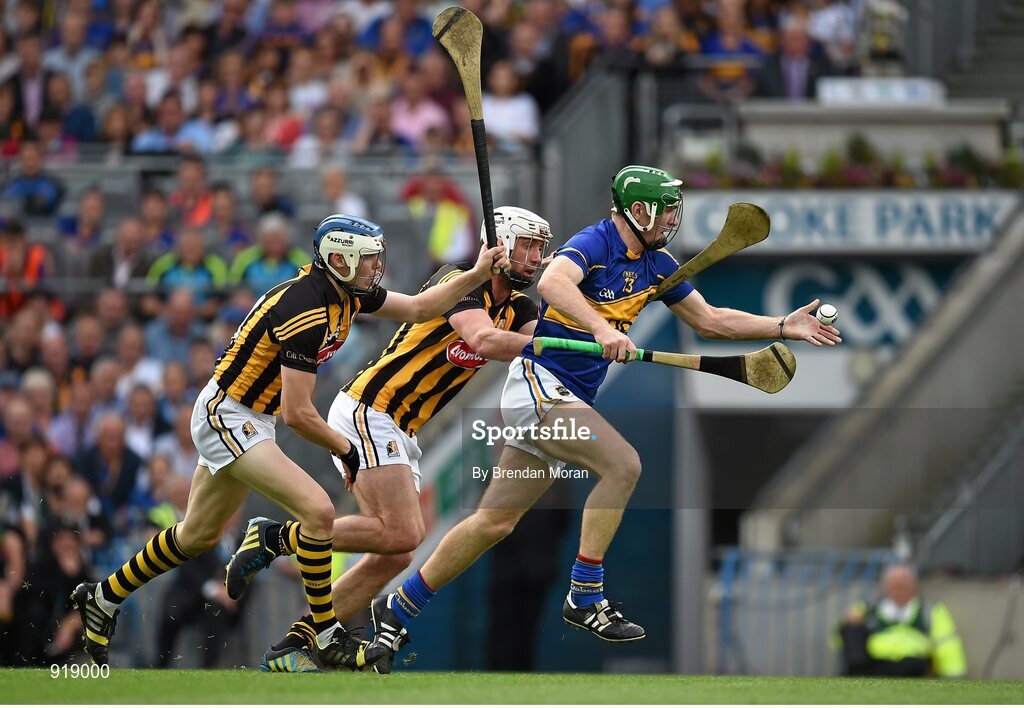 27 September 2014; Noel McGrath, Tipperary, in action against TJ Reid, left, and Michael Fennelly, Kilkenny. GAA Hurling All Ireland Senior Championship Final Replay, Kilkenny v Tipperary. Croke Park, Dublin. Picture credit: Brendan Moran / SPORTSFILE
