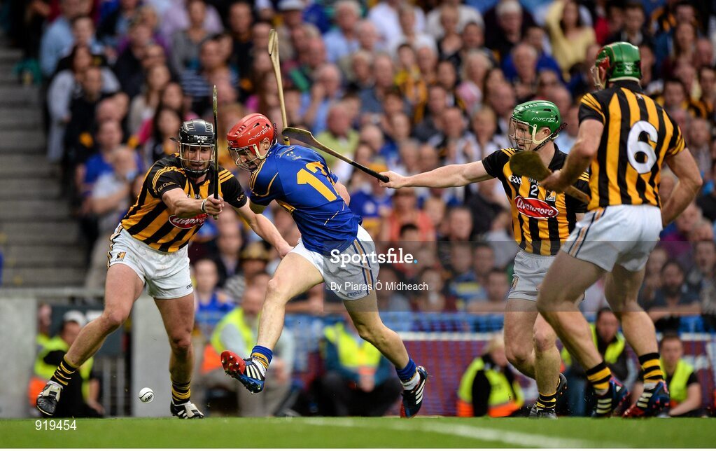 27 September 2014; Shane Bourke, Tipperary, in action against Kilkenny players, from left, Jackie Tyrrell, Paul Murphy and Kieran Joyce, 6. GAA Hurling All Ireland Senior Championship Final Replay, Kilkenny v Tipperary. Croke Park, Dublin. Picture credit: Piaras Ó Mídheach / SPORTSFILE