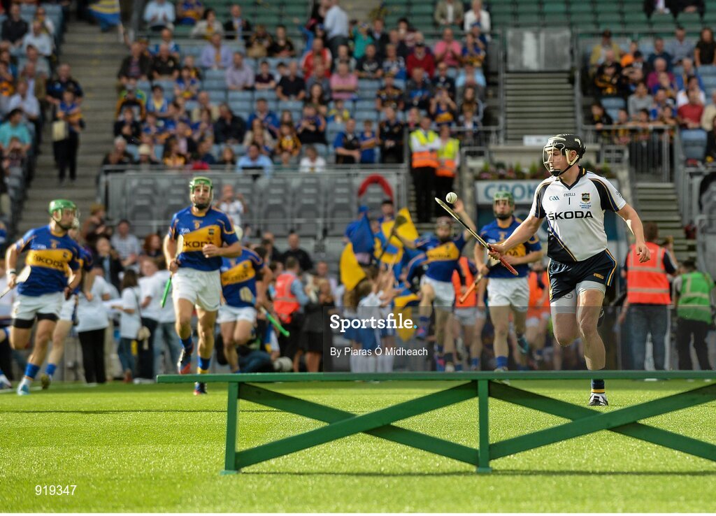 27 September 2014; Tipperary goalkeeper Darren Gleeson runs out onto the pitch for the first half. GAA Hurling All Ireland Senior Championship Final Replay, Kilkenny v Tipperary. Croke Park, Dublin. Picture credit: Piaras Ó Mídheach / SPORTSFILE