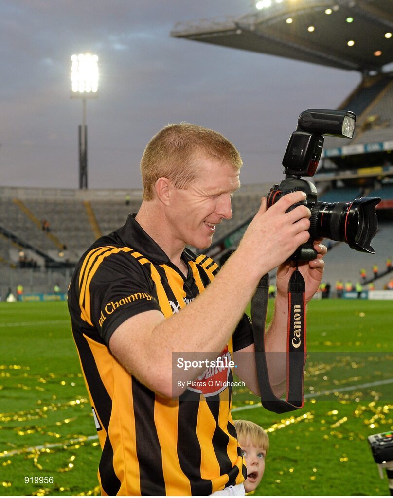 27 September 2014; Kilkenny's Henry Shefflin takes a photograph after the game alongside his son, Henry. GAA Hurling All Ireland Senior Championship Final Replay, Kilkenny v Tipperary. Croke Park, Dublin. Picture credit: Piaras Ó Mídheach / SPORTSFILE
