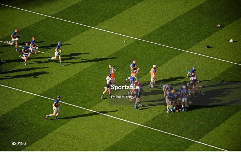 27 September 2014; The Tipperary players make their way to the bench for the team photograph. GAA Hurling All Ireland Senior Championship Final Replay, Kilkenny v Tipperary. Croke Park, Dublin. Picture credit: Pat Murphy / SPORTSFILE