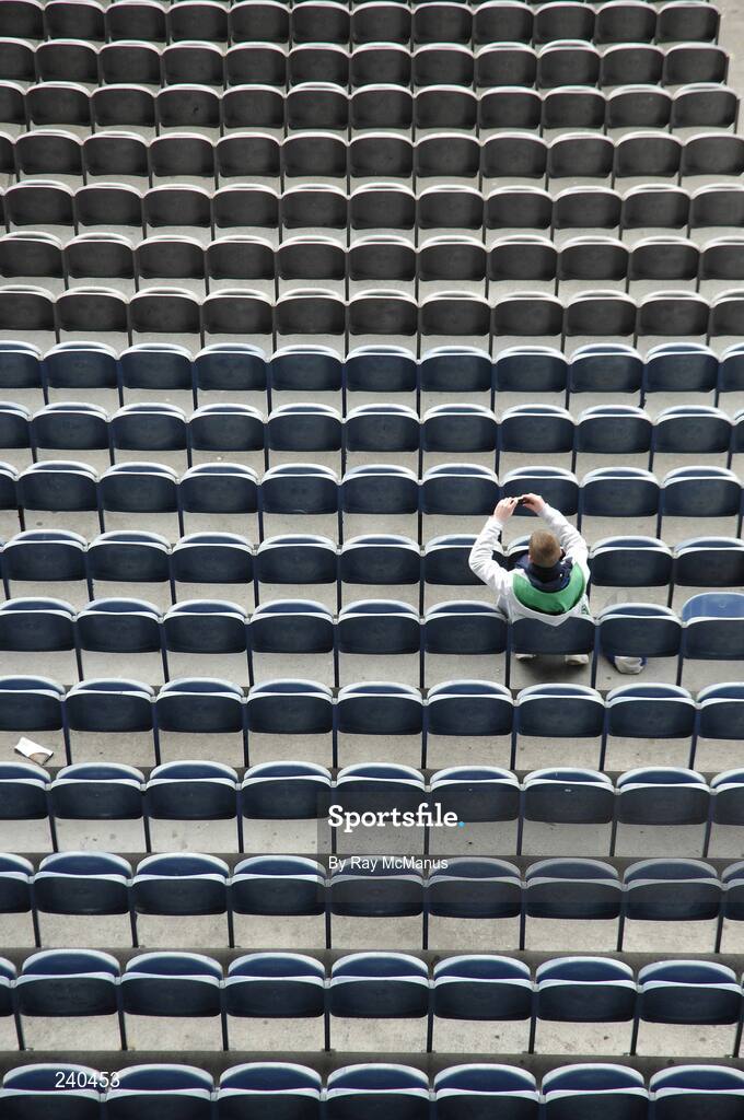 17 March 2007; A lone early supporter takes a photograph as he awaits the start of the game. AIB All-Ireland Senior Club Hurling Championship Final, Ballyhale Shamrocks v Loughrea, Croke Park, Dublin. Picture credit: Ray McManus / SPORTSFILE