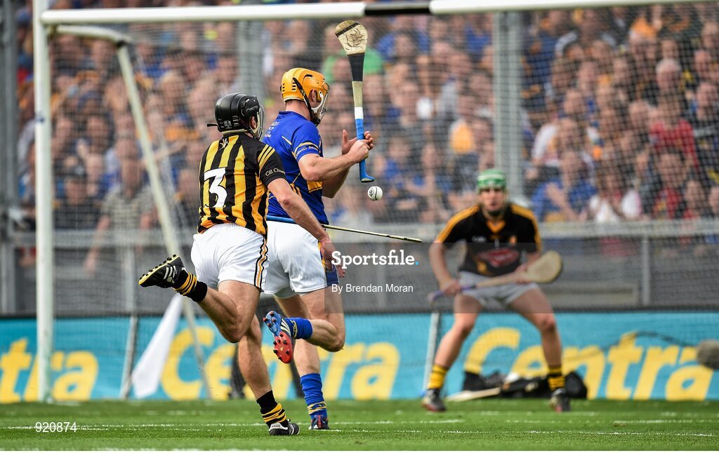 27 September 2014; JJ Delaney, 3, Kilkenny, hooks Seamus Callanan, Tipperary, as he goes for a goal chance during the game. GAA Hurling All Ireland Senior Championship Final Replay, Kilkenny v Tipperary. Croke Park, Dublin. Picture credit: Brendan Moran / SPORTSFILE