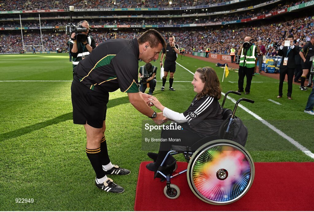 27 September 2014; Ellie Sheehy, Templeglantine, Co. Limerick, presents the match sliotar to referee Brian Gavin before the game. GAA Hurling All Ireland Senior Championship Final Replay, Kilkenny v Tipperary. Croke Park, Dublin. Picture credit: Brendan Moran / SPORTSFILE